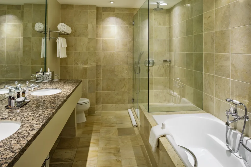 a bathroom with two sinks and a bathtub